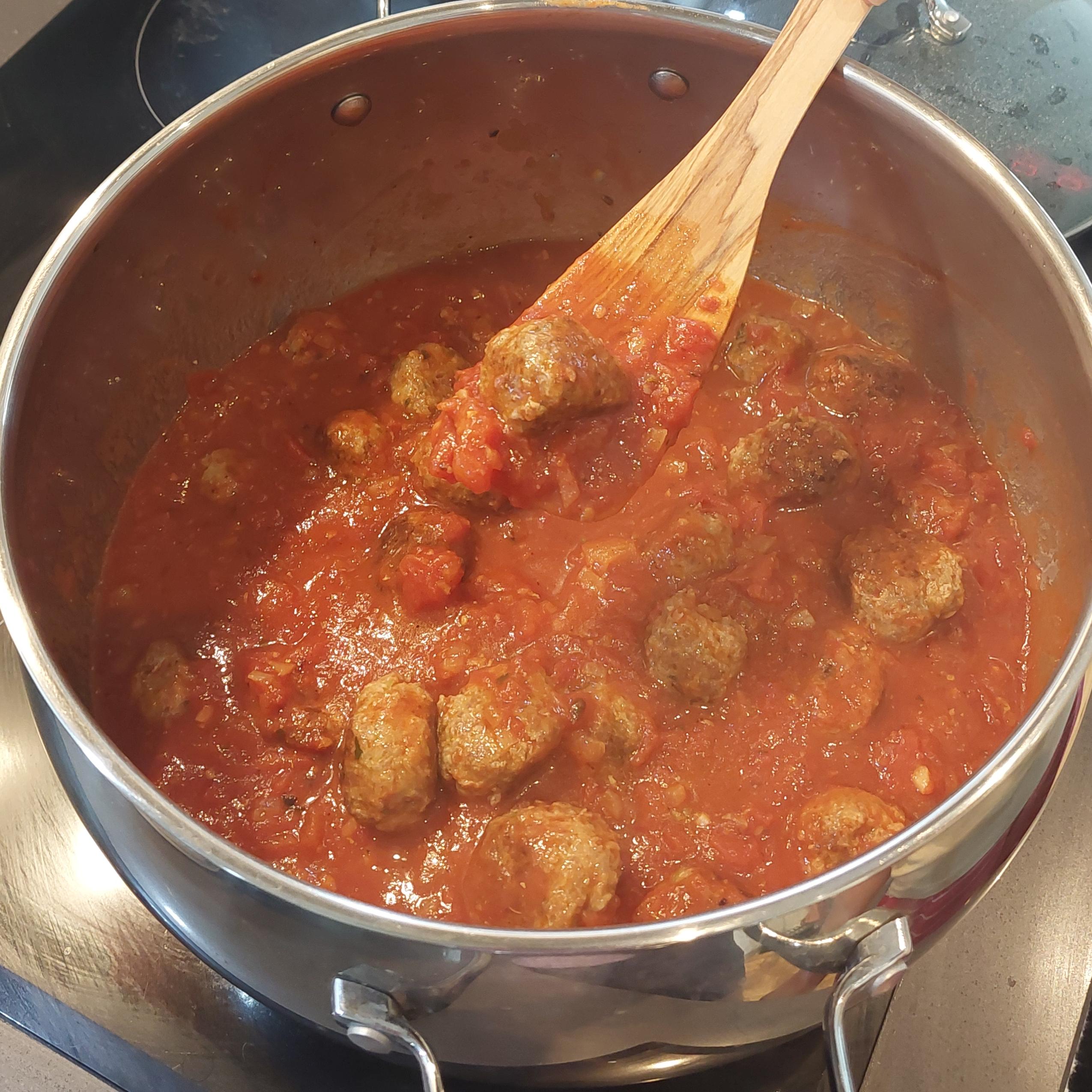 Add the meat balls and simmer for 5-10 mins.