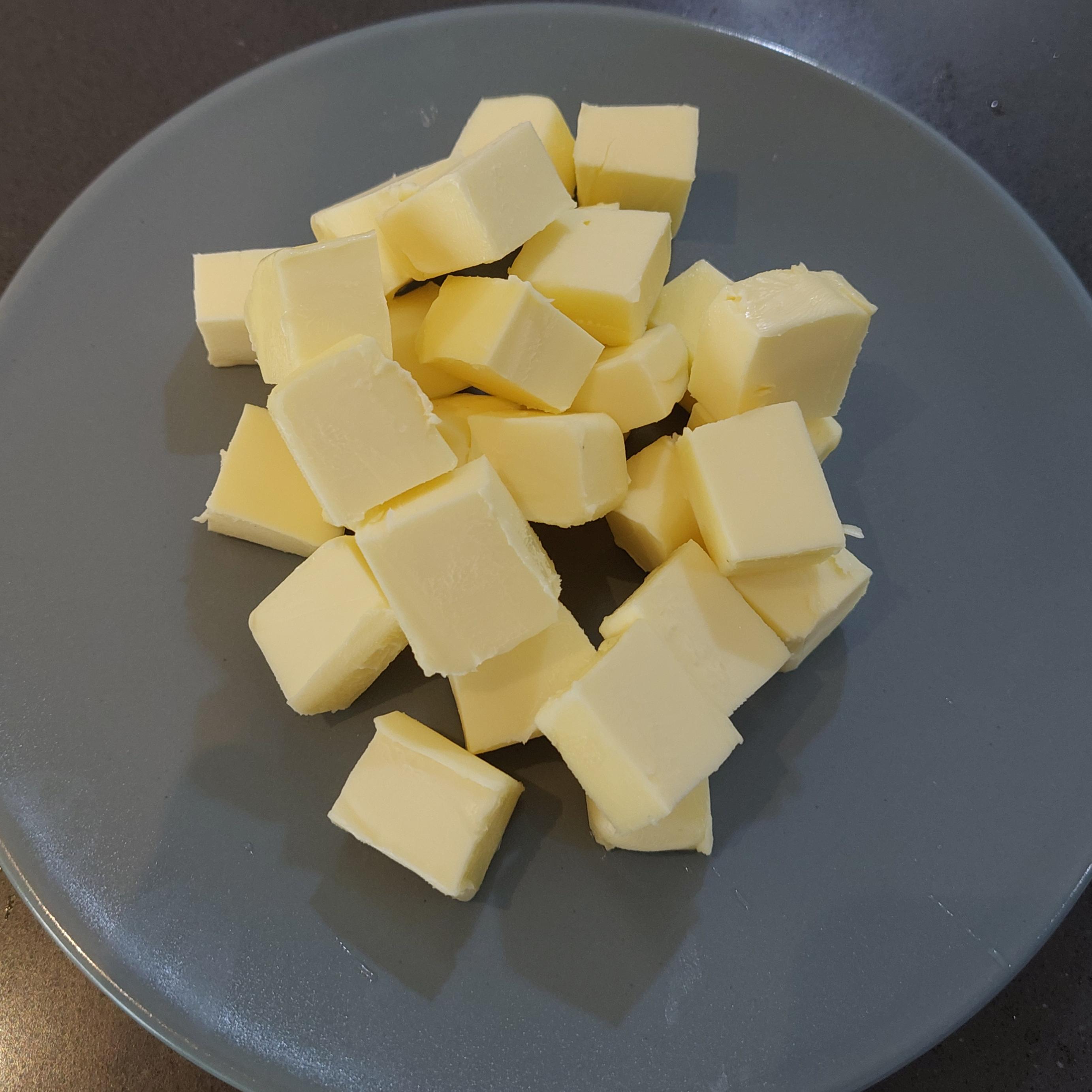 Cut butter into small cubes.