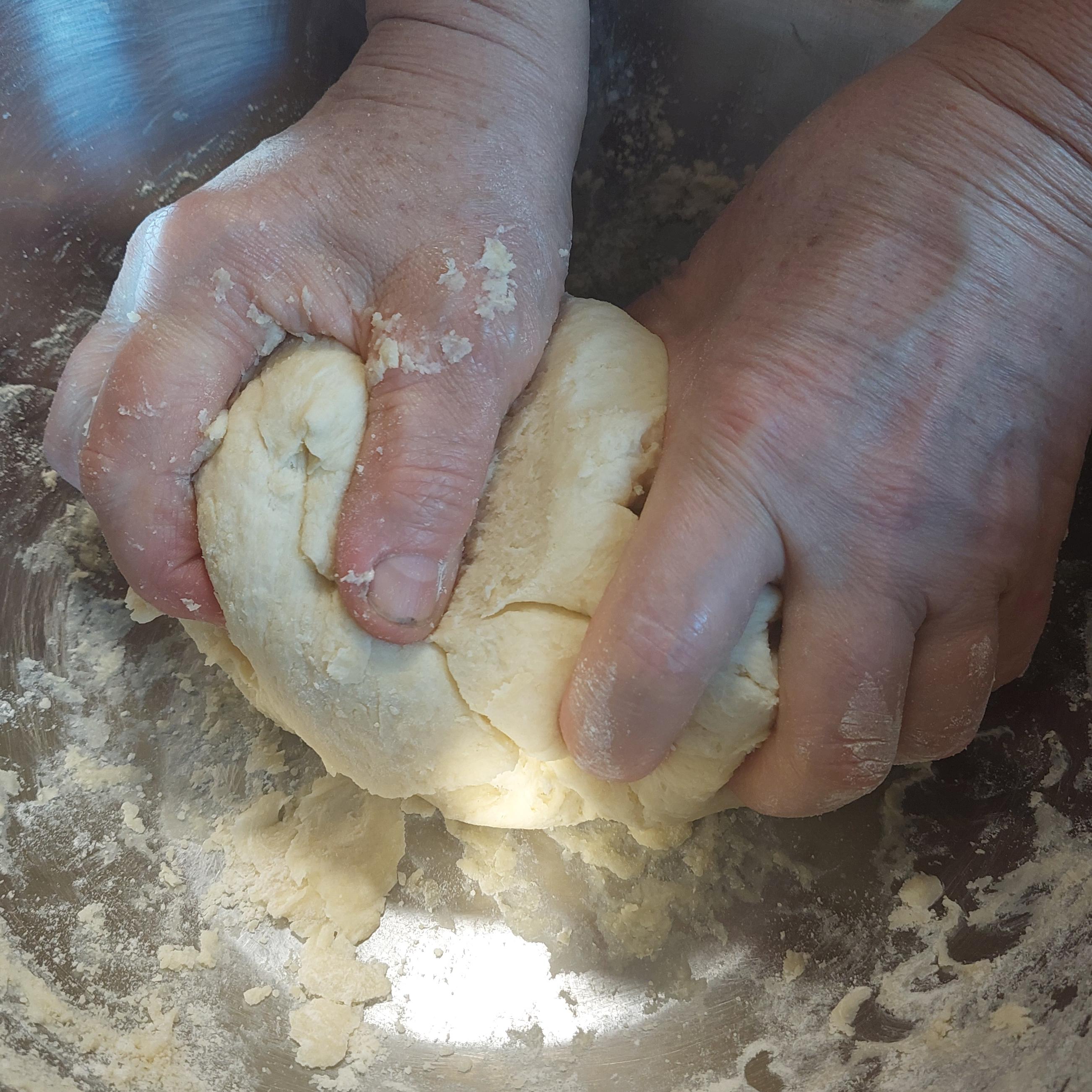 Work the dough with hands into a ball for a few minutes