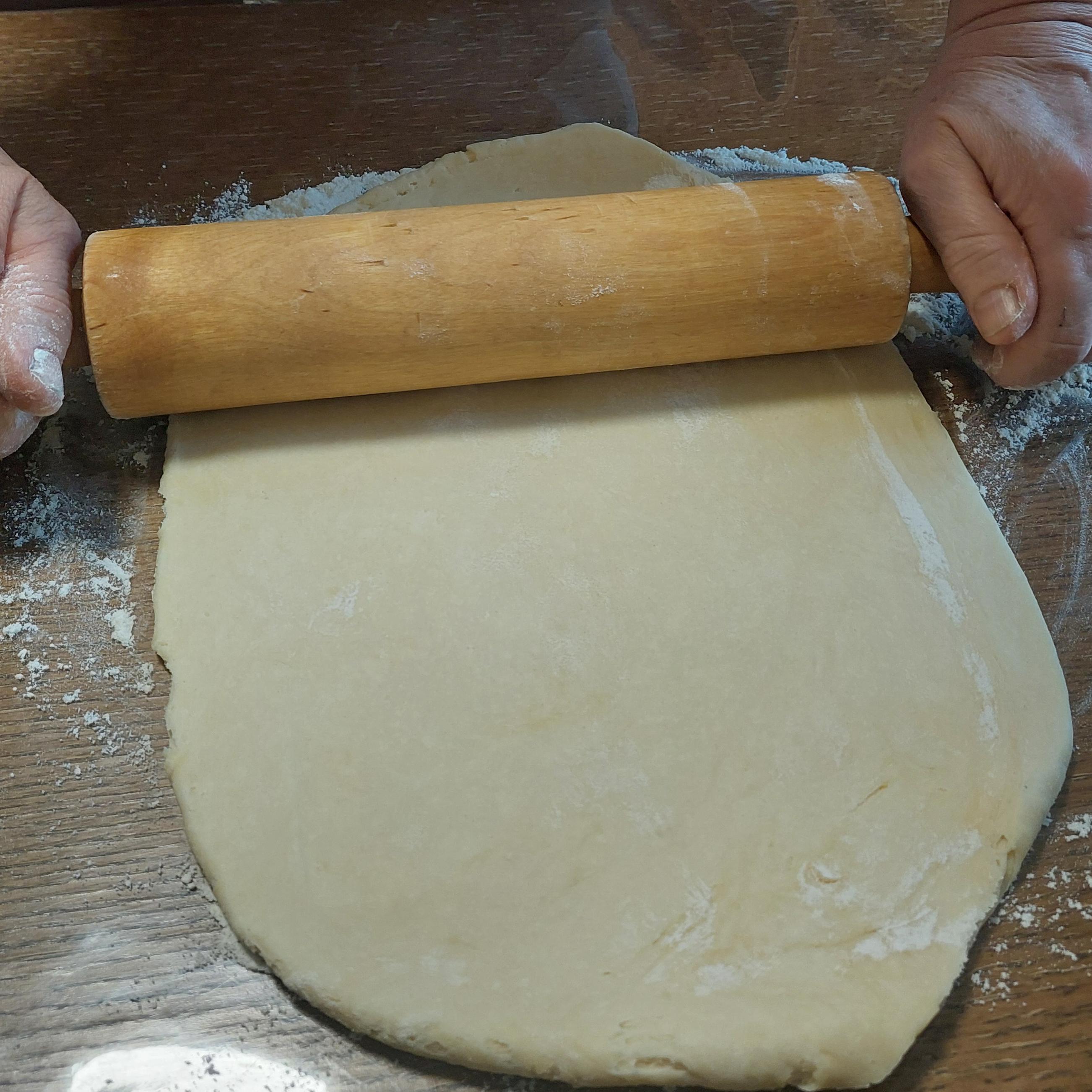 Roll out the dough to about half cm thickness.
