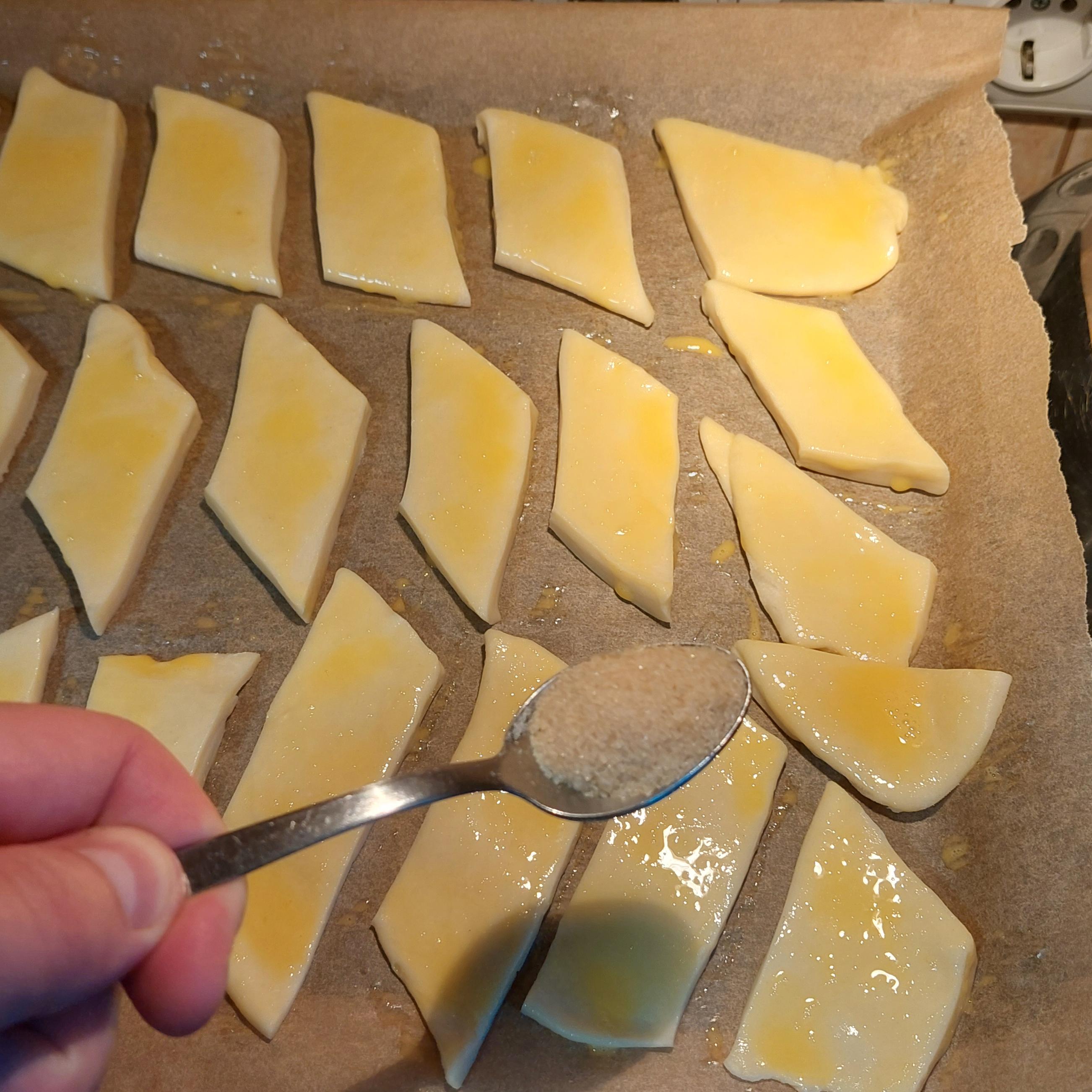 Sprinkle sugar on each biscuit