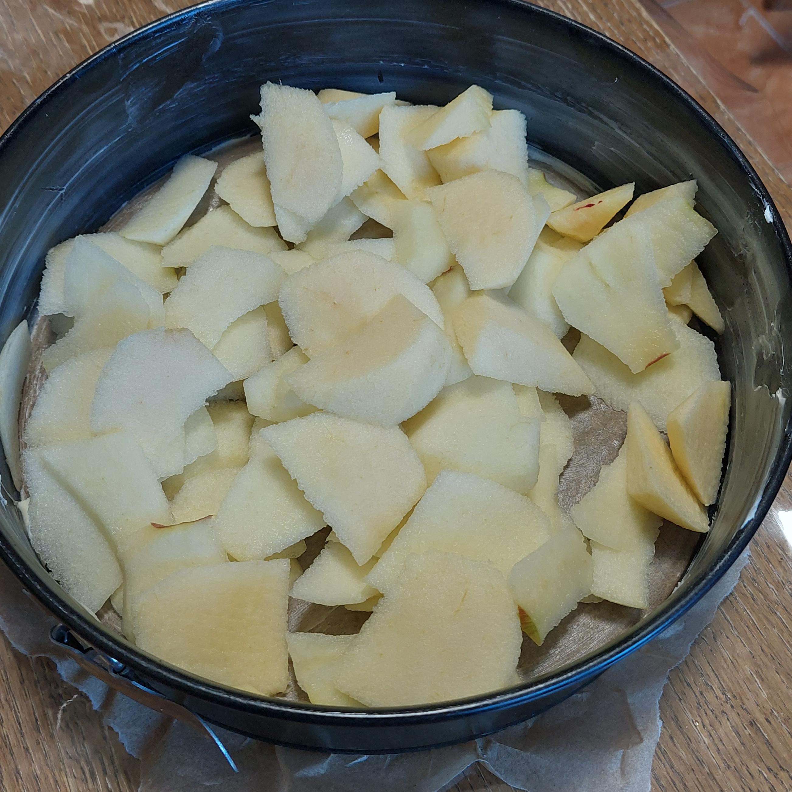Peel and slice apples into the tray.